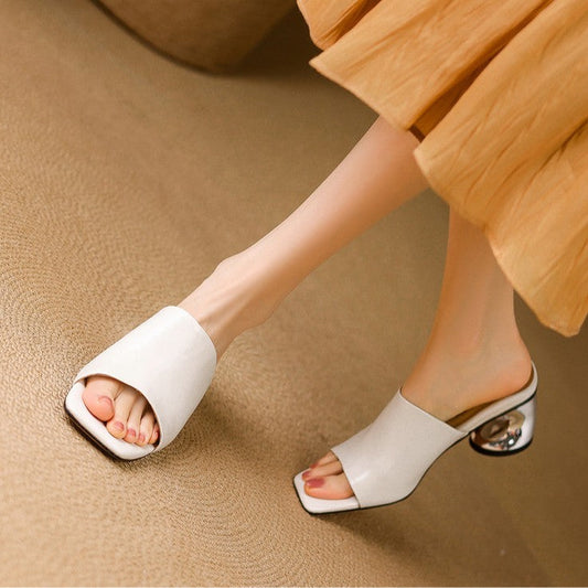 Virelle Curve | Mules de cuero con tacón
