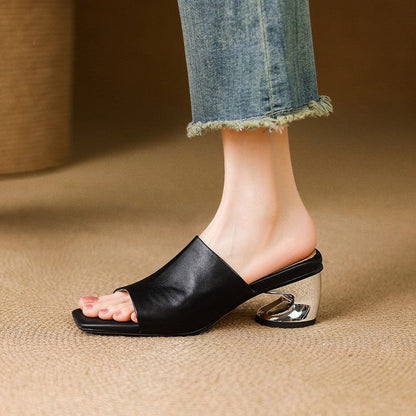 Virelle Curve | Mules de cuero con tacón