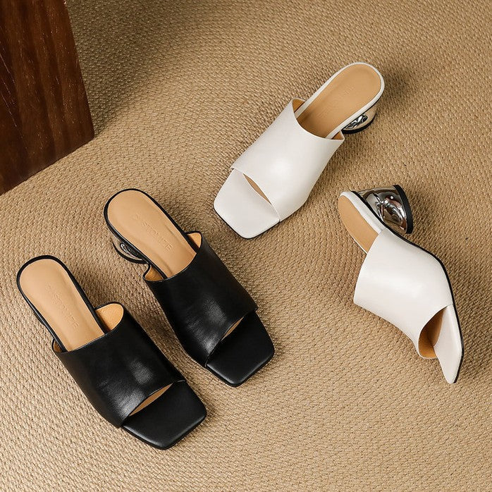 Virelle Curve | Mules de cuero con tacón