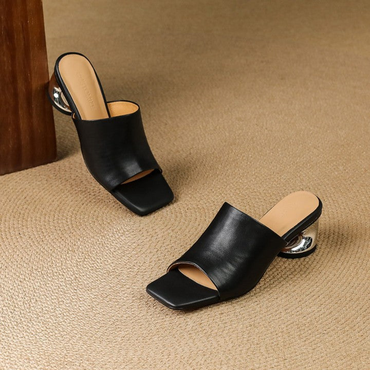Virelle Curve | Mules de cuero con tacón