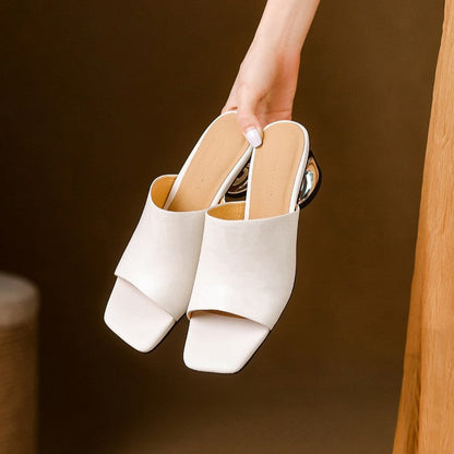 Virelle Curve | Mules de cuero con tacón