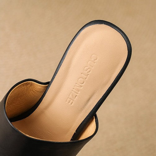 Virelle Curve | Mules de cuero con tacón