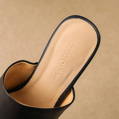 Virelle Curve | Mules de cuero con tacón