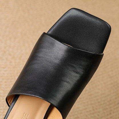 Virelle Curve | Mules de cuero con tacón